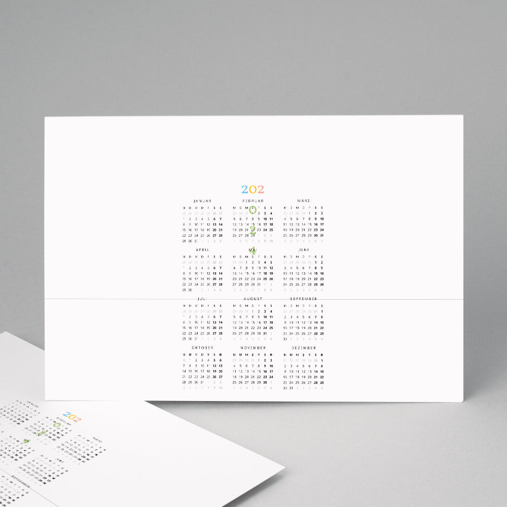 Kalender Weihnachten Einseitiges Landschaftslayou Regenbogen von Farben foto N° 2