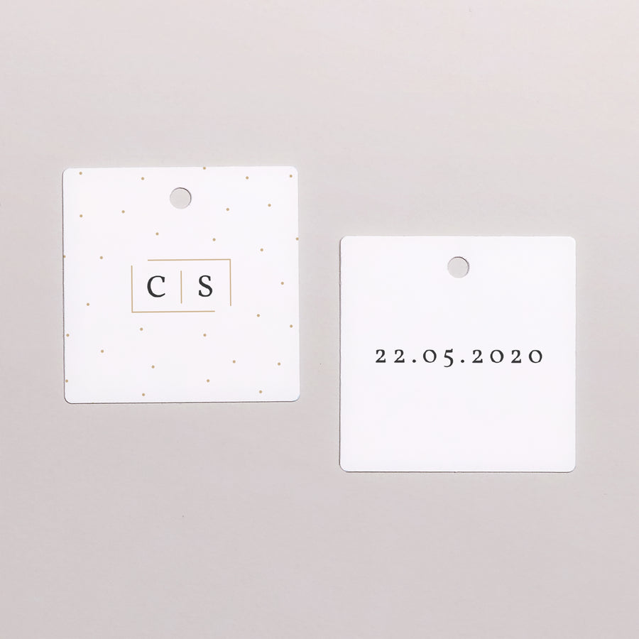 Vorgelochtes Etikett Hochzeit quadratisch Goldene Tasten foto
