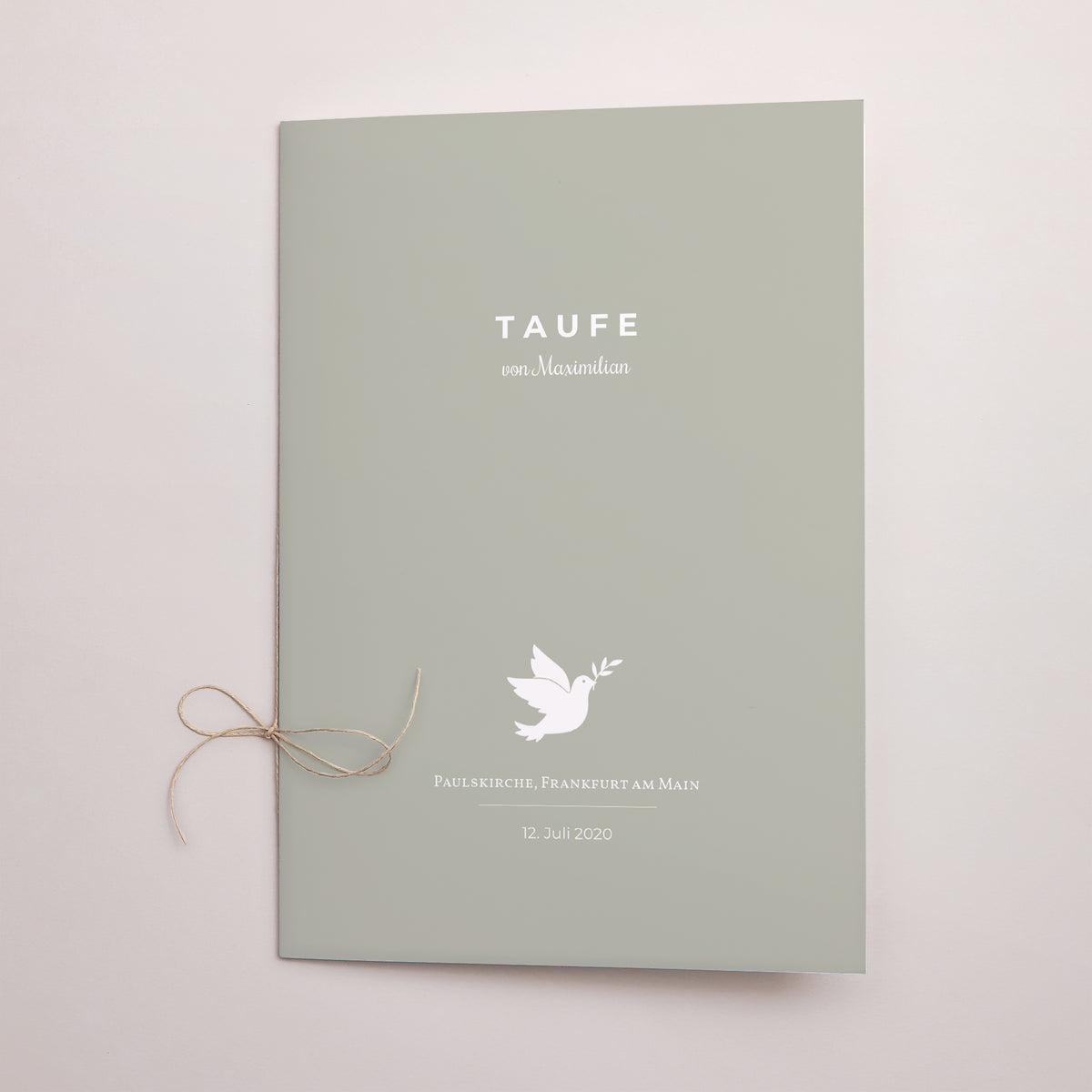 Kirchenheft Taufe Doppelflügel Krone Taube foto