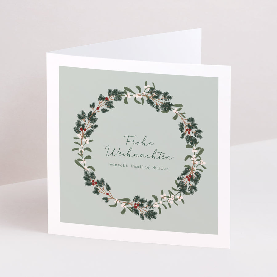 Weihnachtskarte Weihnachten Doppelflügiges Quadrat Kranz Tanne und Mistelzweig foto