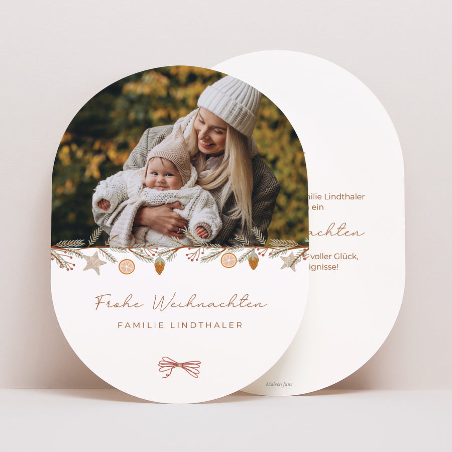 Weihnachtskarte Weihnachten oval Wintergirlande foto