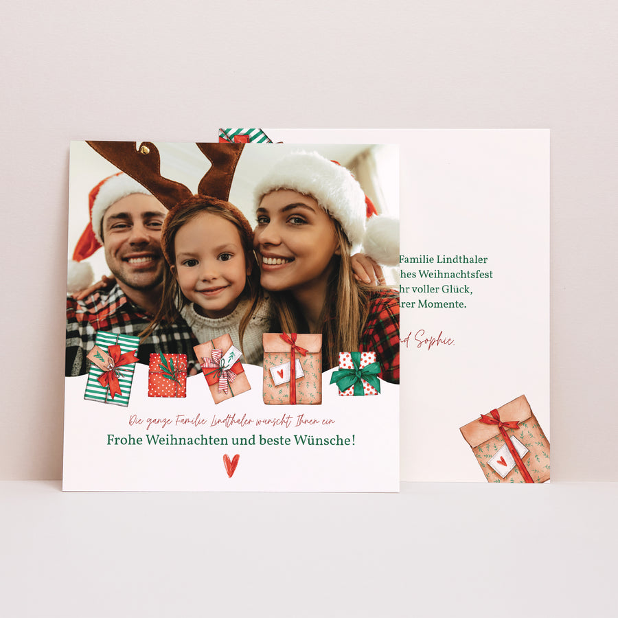 Weihnachtskarte Weihnachten Quadrat Pakete der Freude foto