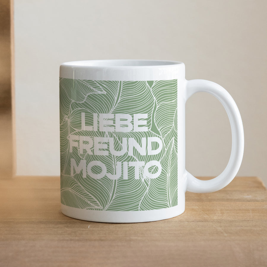 Tasse Objekte Weiß grünes Laub foto