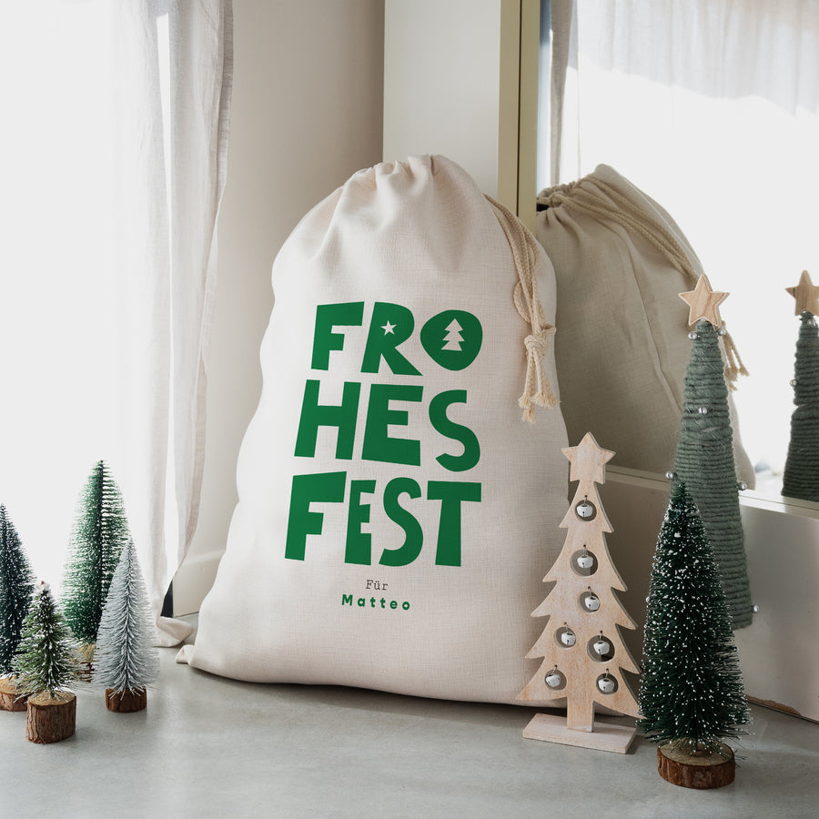 Weihnachtssack Objekte Großformat Frohes Fest Grün foto