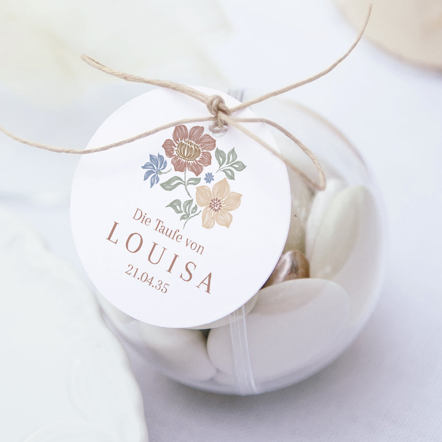 Geschenkbox Taufe Kugel mit runder Etikette Gekritzelte Blumen foto
