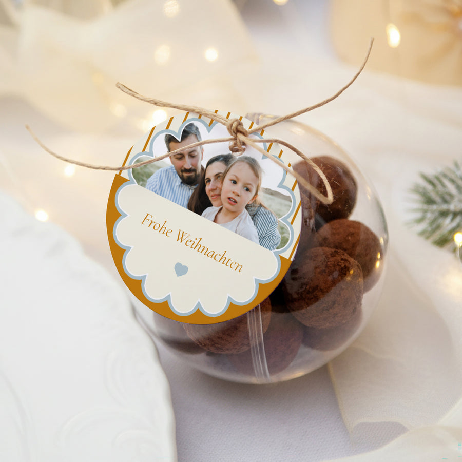Geschenkbox Weihnachten Kugel mit runder Etikette Blaue Ambra foto